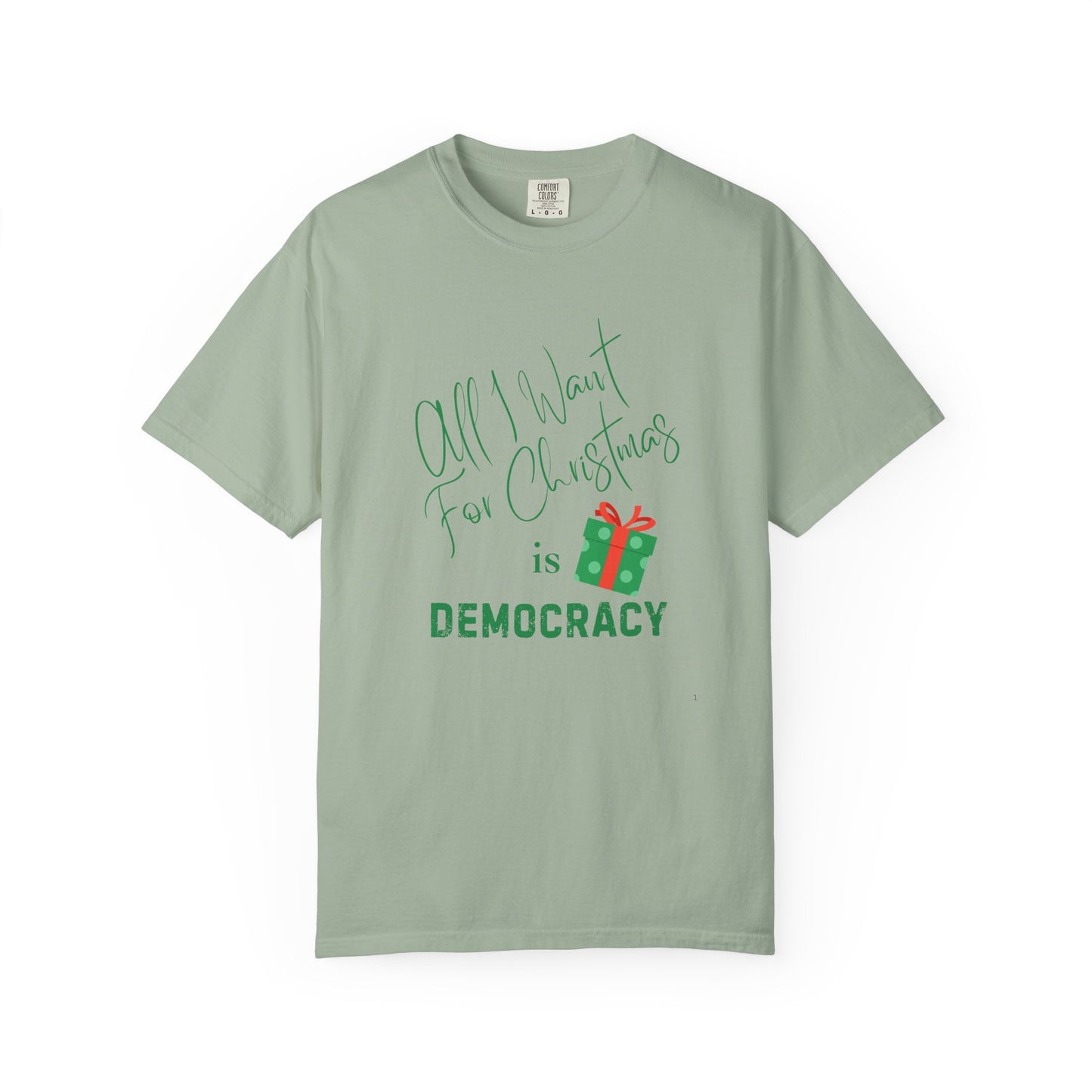 Green t-shirt with text 'All I Want for Christmas is Democracy' on a white background