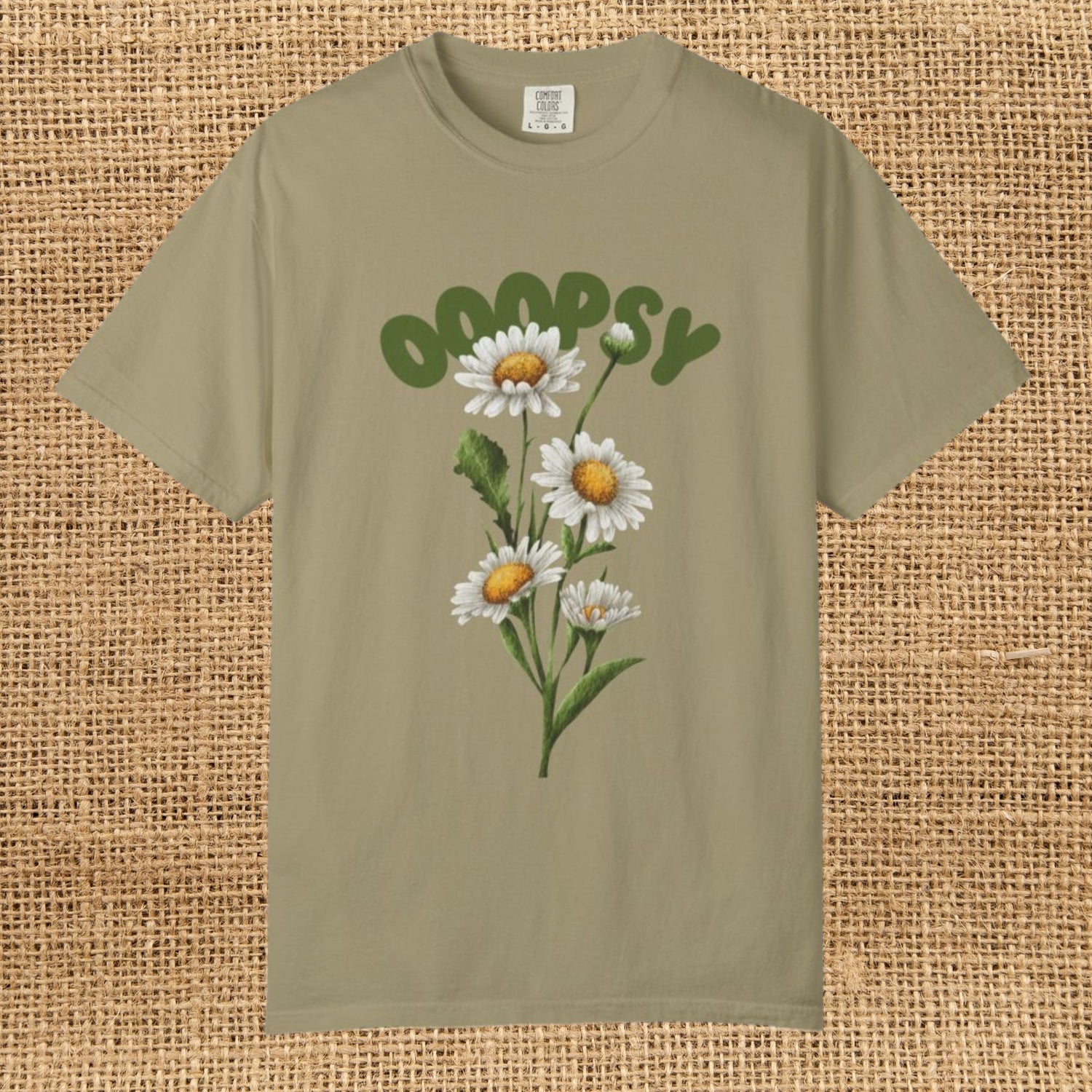Graphic of daisies.  Text says "Ooopsy"