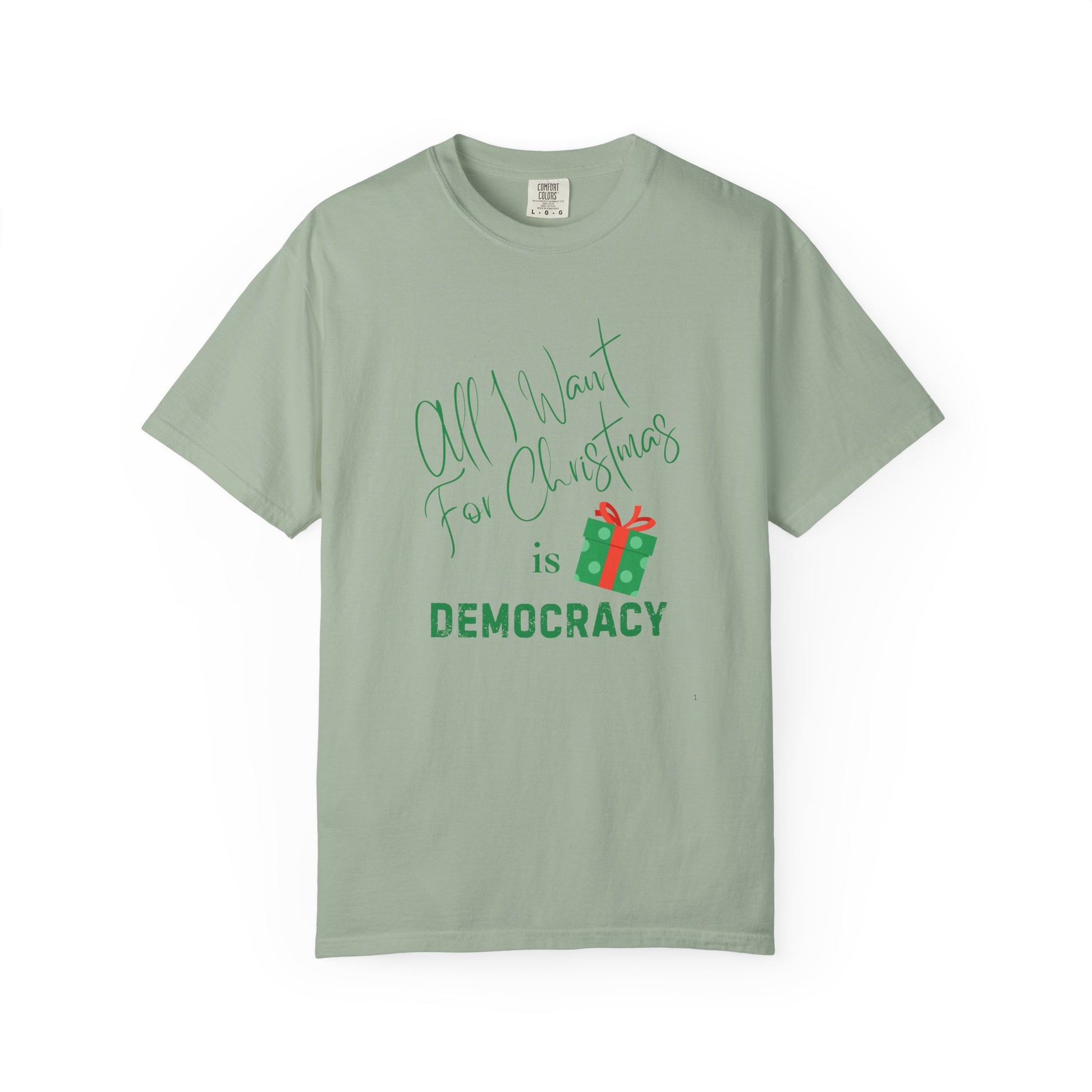 Green t-shirt with text 'All I Want for Christmas is Democracy' on a white background