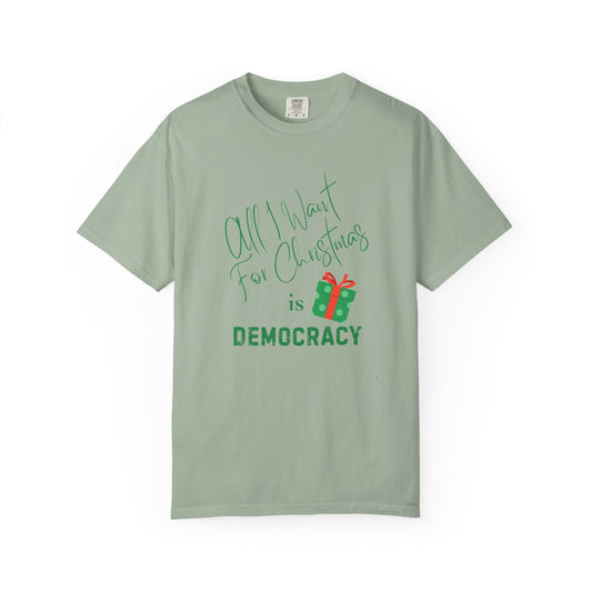 Green t-shirt with text 'All I Want for Christmas is Democracy' on a white background