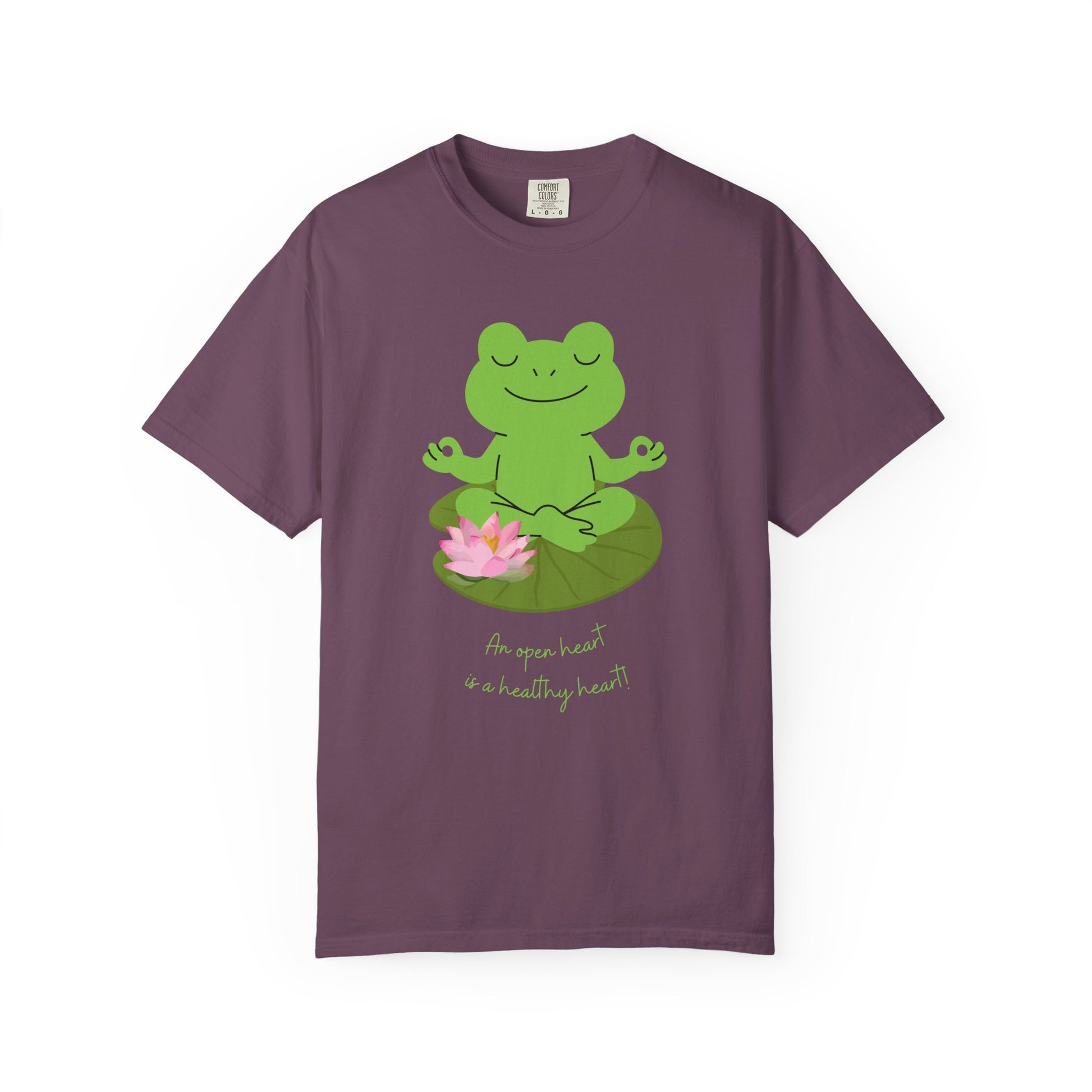 Purple t-shirt with a green frog meditating on a lotus flower graphic and text.