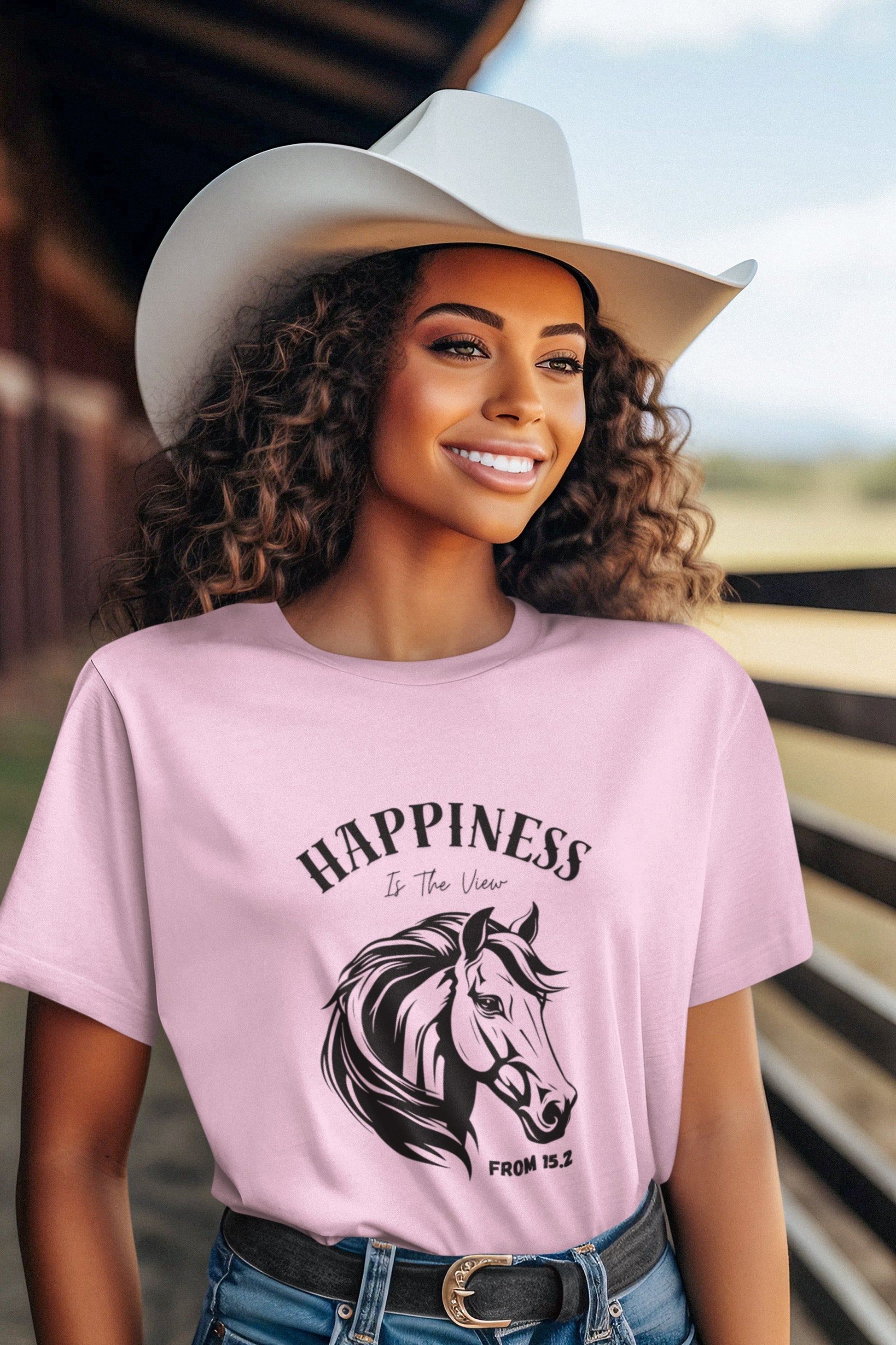 Pink t shirt with horse head and nice saying on woman with cowboy had