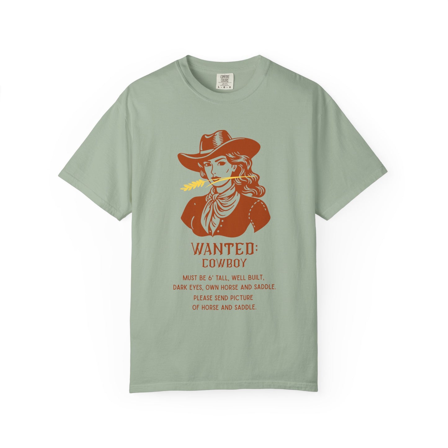 Green T shirt with Wanted poster and cowgirl with funny saying.