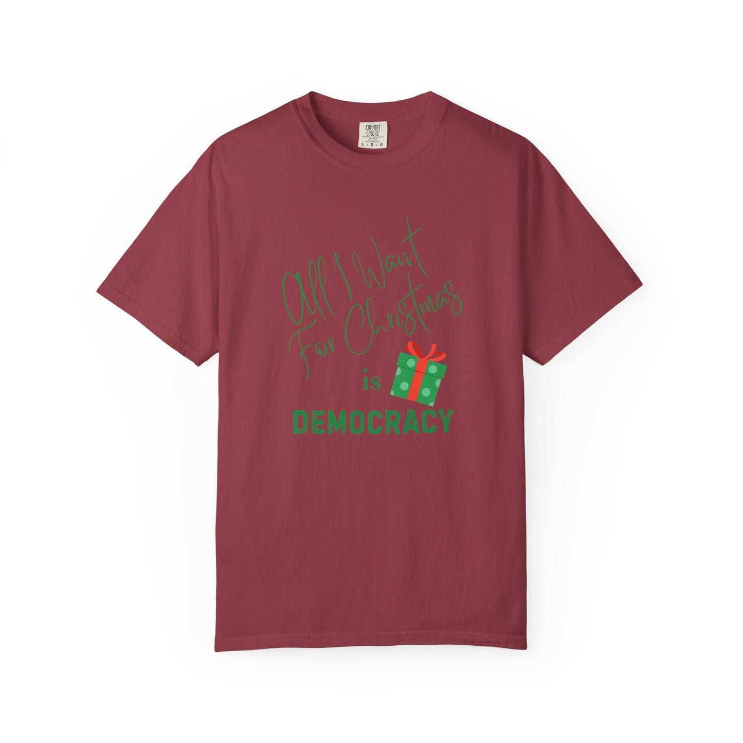 Maroon t-shirt with Christmas-themed text and graphics on a white background