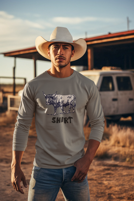 Grey ong-sleeve crewneck t-shirt featuring a black graphic of a bull and the word 'SHIRT' printed underneath, "Bull Shirt" worn by cowboy.
