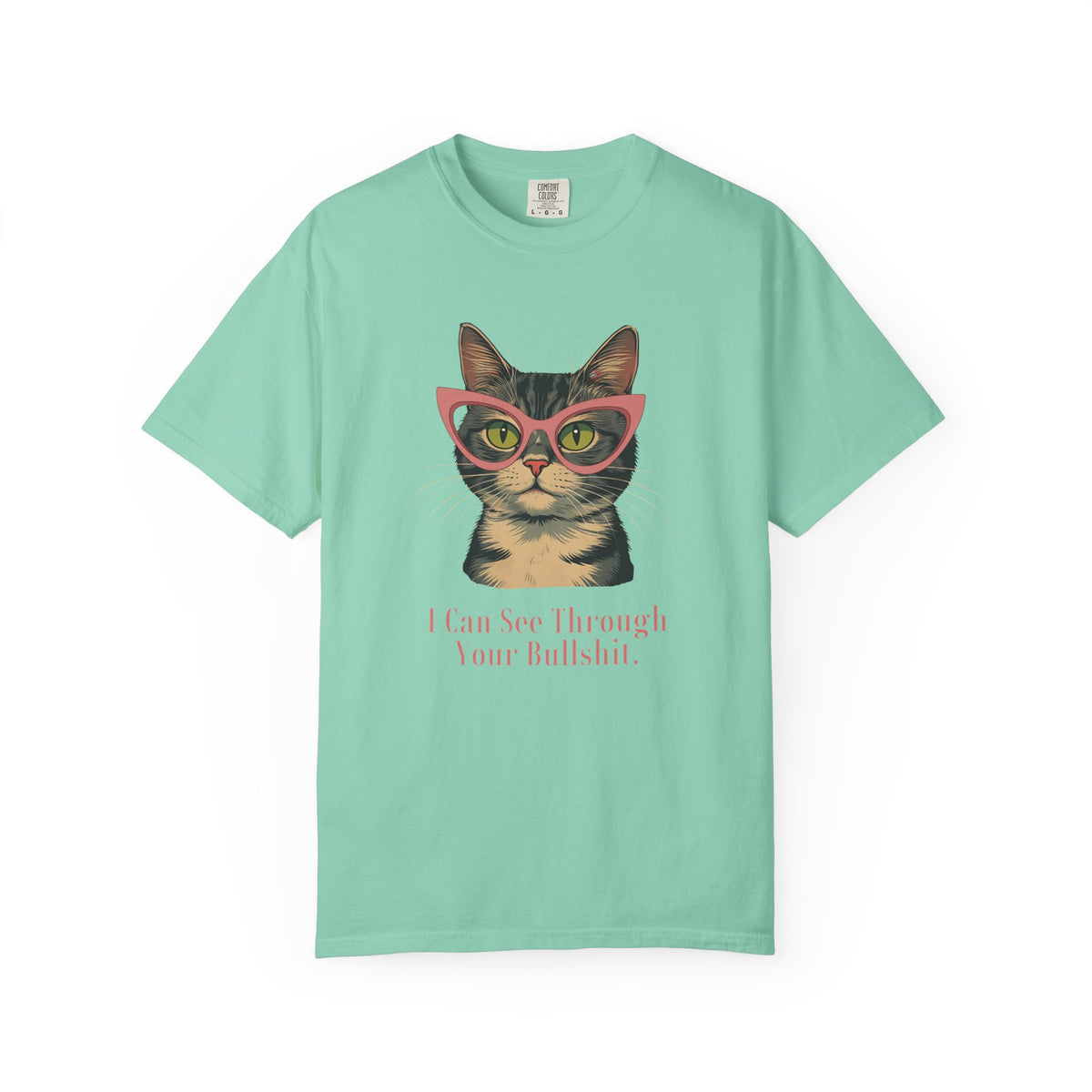 Mint Green short-sleeve t-shirt with a graphic of a tabby cat wearing pink glasses and the text 'I Can See Through Your Bullshit.' printed below, displayed on a clean white background.