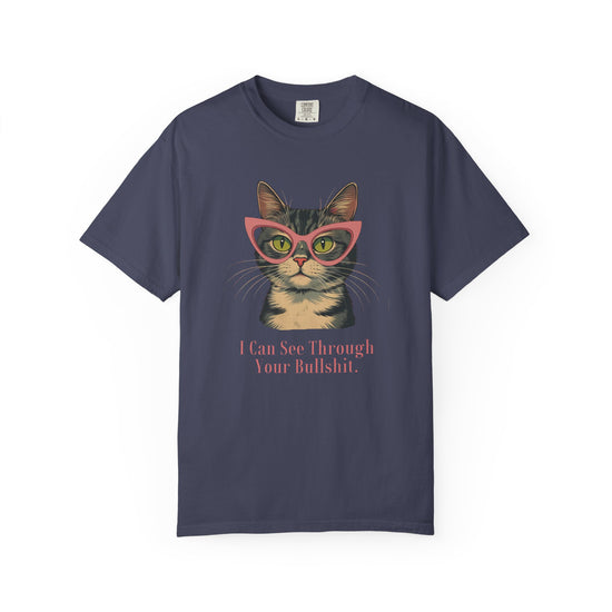 Navy short-sleeve t-shirt with a graphic of a tabby cat wearing pink glasses and the text 'I Can See Through Your Bullshit.' printed below, displayed on a clean white background.