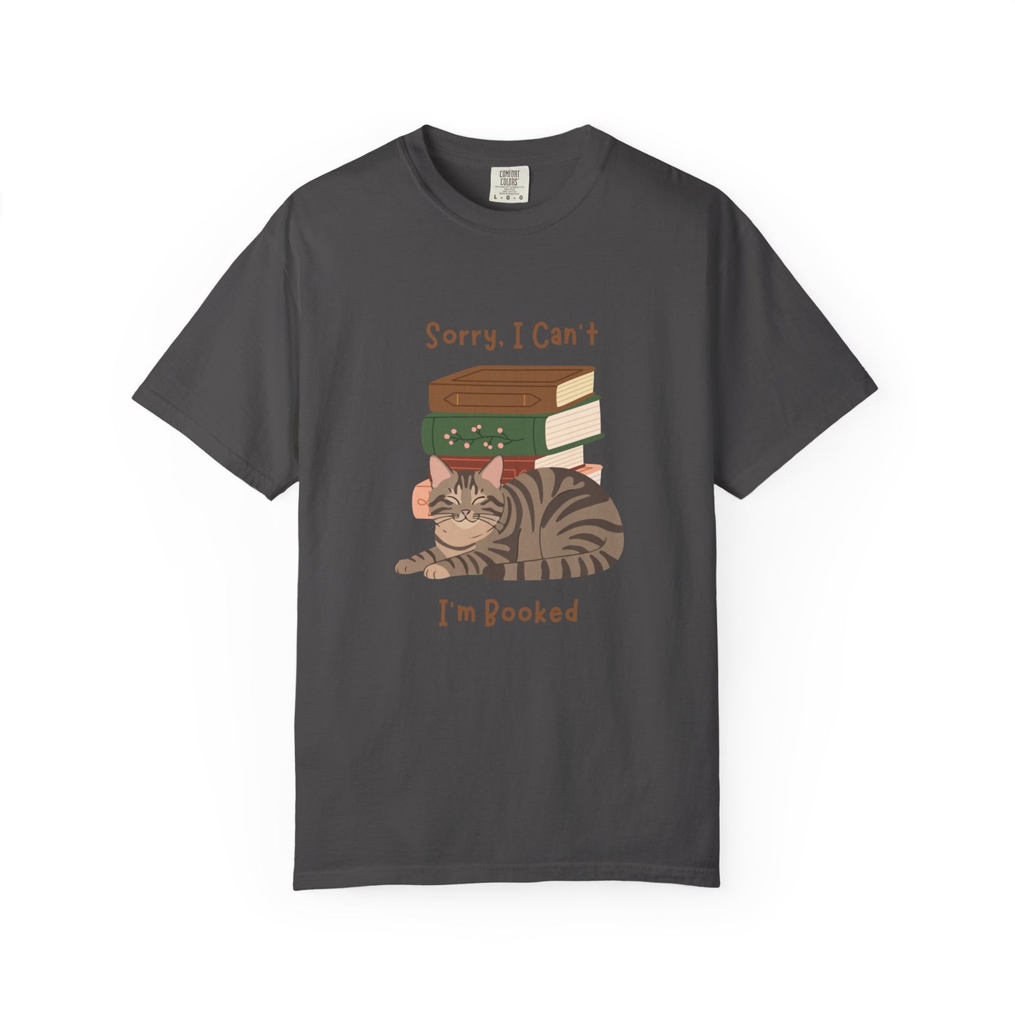 Black  cotton tshirt with graphic of a cat laying in front of stack of books.  Text says, Sorry, I can't.  I'm booked.