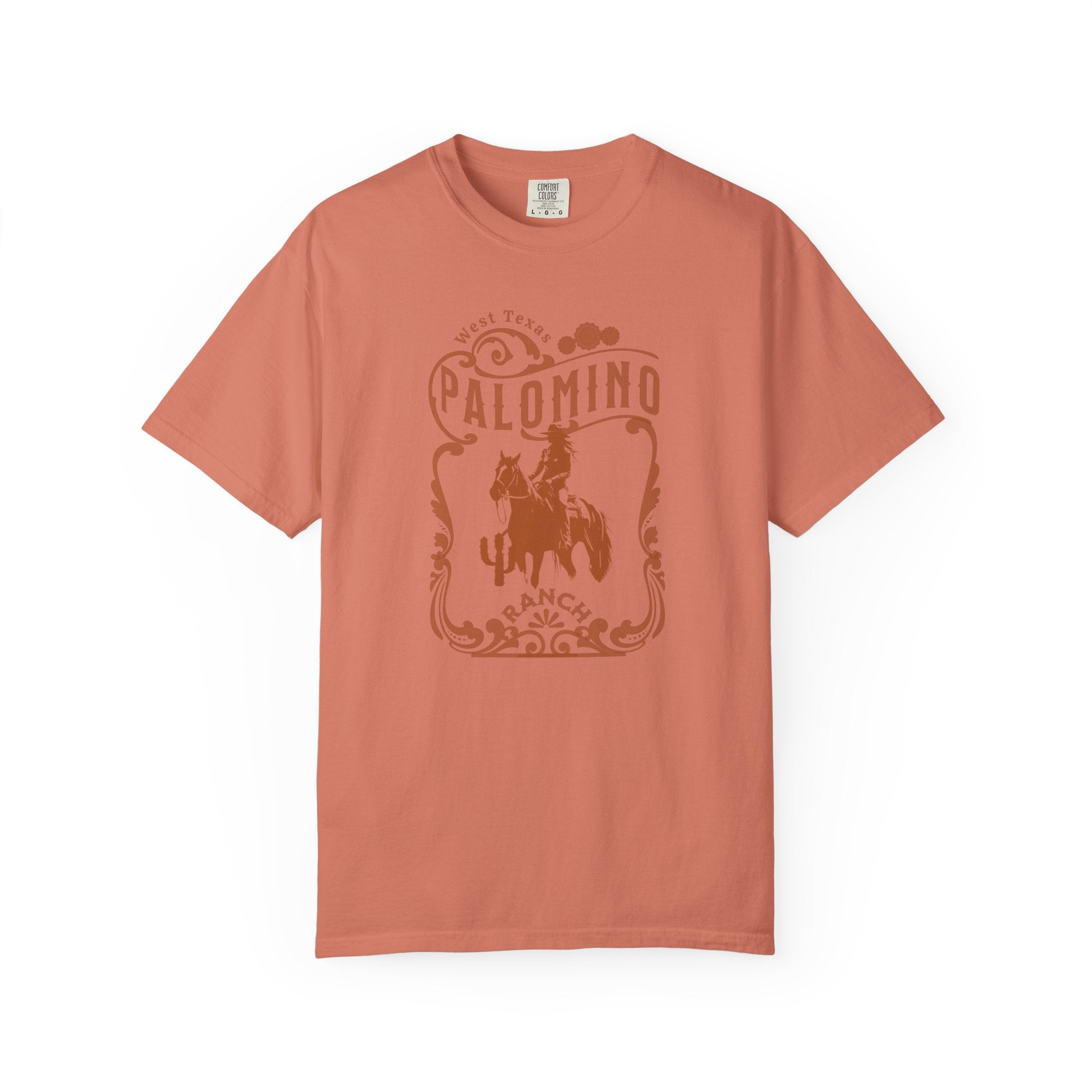 Orange  t-shirt with a graphic design of a horse and rider, and 'Palomino Ranch' text 