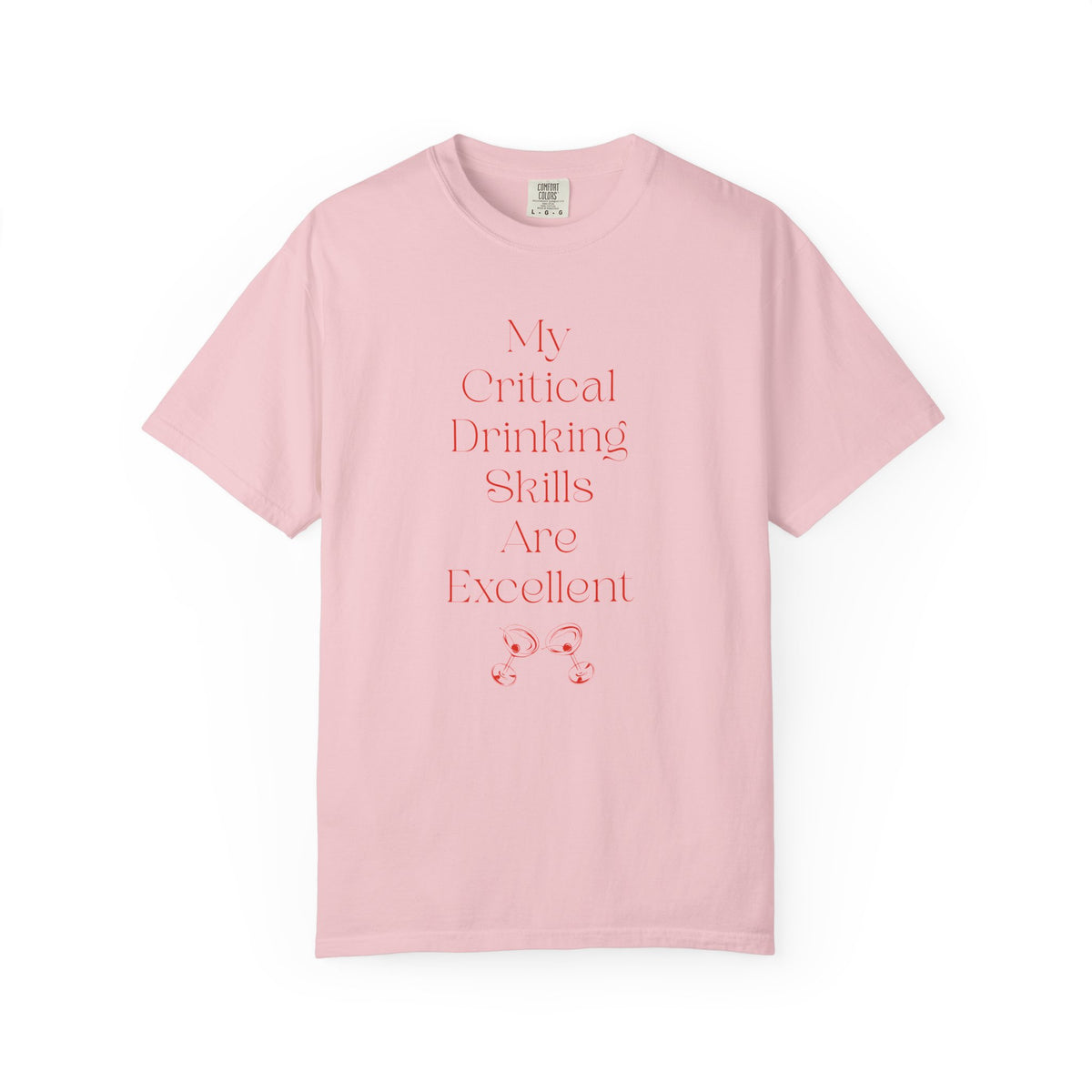 Pink short sleeve, crew neck t-shirt has text that says "My critical drinking skills are excellent" and  a graphic of two martini glasses.