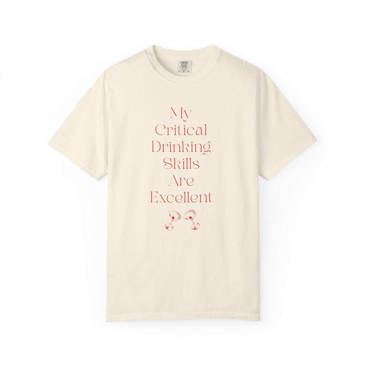 Ivory short sleeve, crew neck t-shirt has text that says "My critical drinking skills are excellent" and  a graphic of two martini glasses.