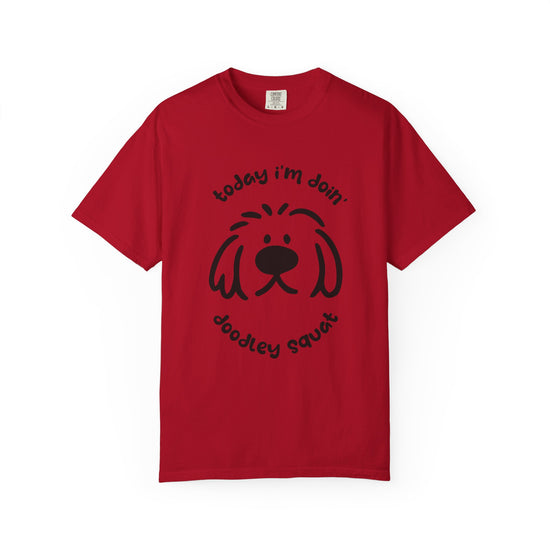 Red short-sleeve crewneck t-shirt featuring a black graphic of a dog's face with the text 'Today i'm Doin' Doodley Squat" displayed on a clean white background.