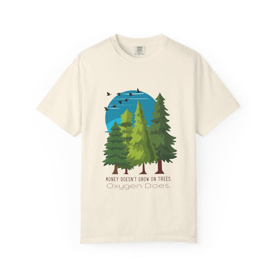 Beige t-shirt with a graphic of trees and birds on a white background