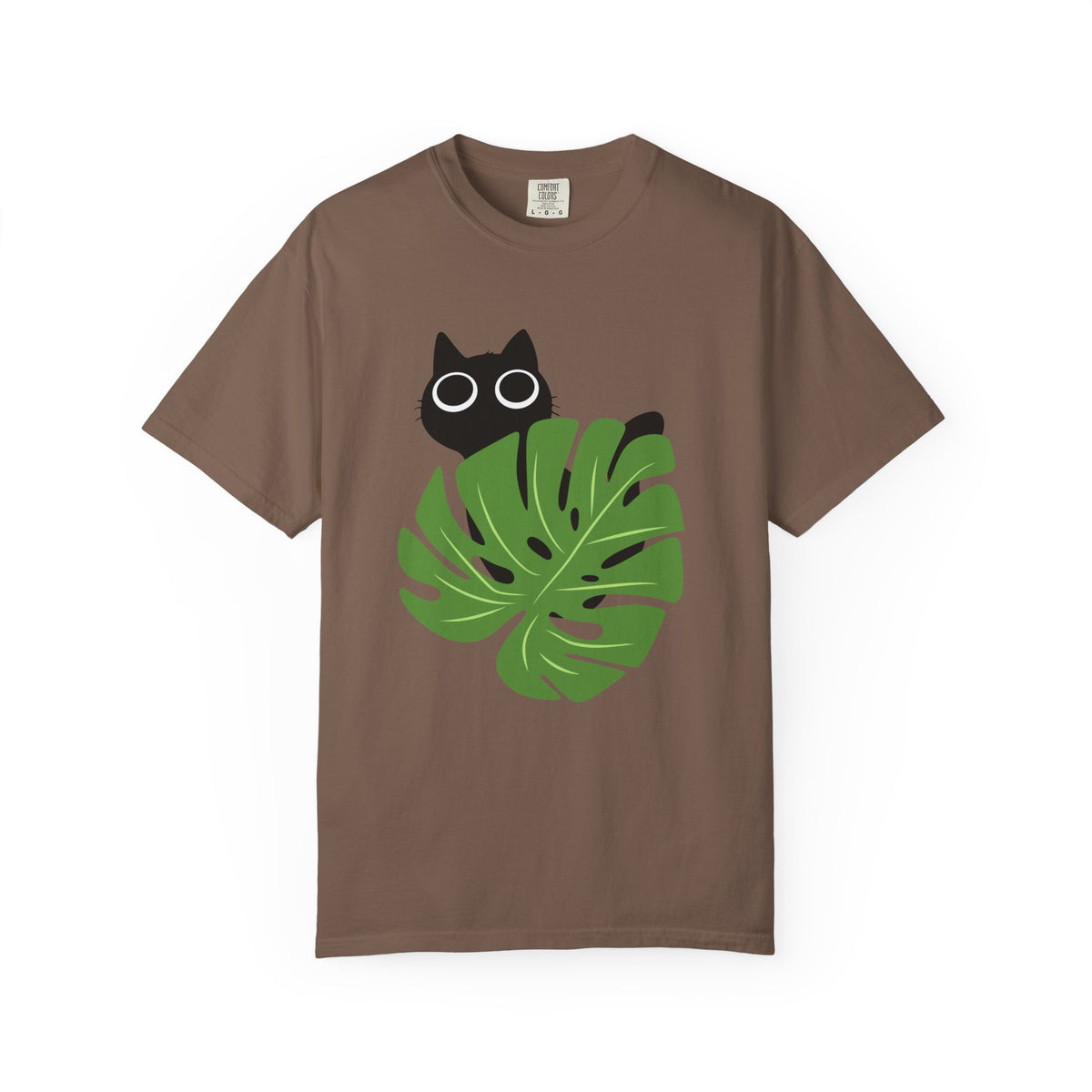 Brown short-sleeve crewneck t-shirt featuring a graphic of a black cat peeking over a green monstera leaf with white-rimmed glasses, displayed on a clean white background.