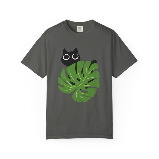 Vintage Black short-sleeve crewneck t-shirt featuring a graphic of a black cat peeking over a green monstera leaf with white-rimmed glasses, displayed on a clean white background.
