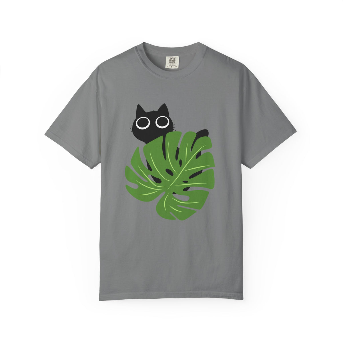 Grey short-sleeve crewneck t-shirt featuring a graphic of a black cat peeking over a green monstera leaf with white-rimmed glasses, displayed on a clean white background.