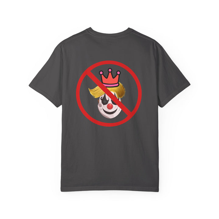 A dark gray short-sleeve t-shirt with a graphic print on the front showing a clown face with a gold crown, overlaid with a red prohibition symbol, displayed on a solid white background.