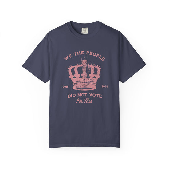 Blue t-shirt with pink text and crown graphic and text says 'No Kings'