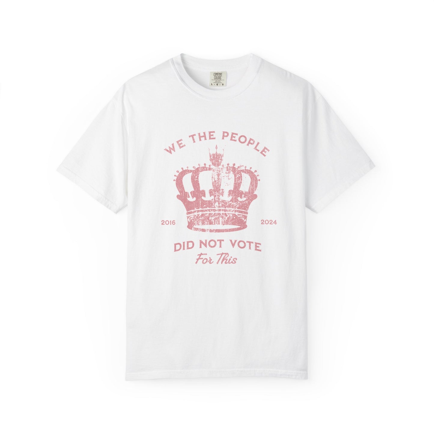 White t-shirt with pink text and crown graphic and text says 'No Kings'