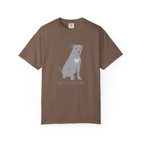 Brown short-sleeve crewneck t-shirt featuring a graphic of a pit bull dog with a white heart on its chest sitting and the text 'Who Rescued Who' printed below it.