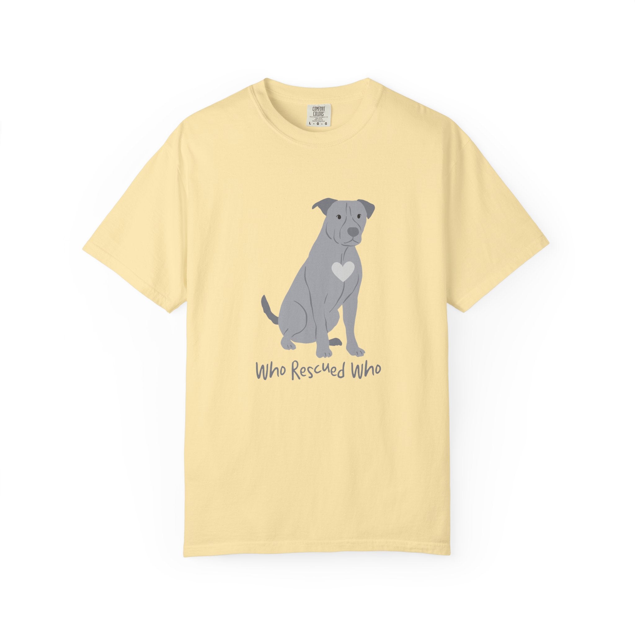 Yellow short-sleeve crewneck t-shirt featuring a graphic of a pit bull dog with a white heart on its chest sitting and the text 'Who Rescued Who' printed below it.