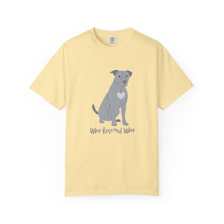 Yellow short-sleeve crewneck t-shirt featuring a graphic of a pit bull dog with a white heart on its chest sitting and the text 'Who Rescued Who' printed below it.
