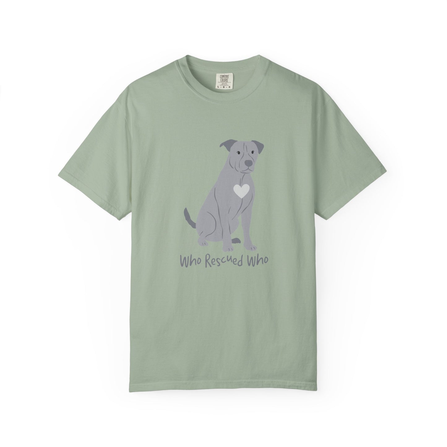 Green  short-sleeve crewneck t-shirt featuring a graphic of a pit bull dog with a white heart on its chest sitting and the text 'Who Rescued Who' printed below it.