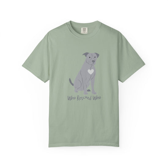 Green  short-sleeve crewneck t-shirt featuring a graphic of a pit bull dog with a white heart on its chest sitting and the text 'Who Rescued Who' printed below it.