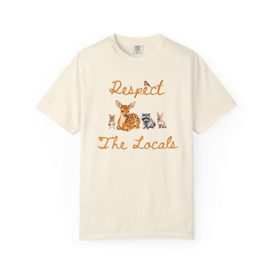 An off-white short-sleeve crewneck t-shirt featuring a graphic print of a fawn, a raccoon, and a rabbit under the text 'Respect The Locals' in orange-brown script.