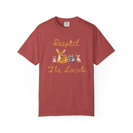 Red short-sleeve crewneck t-shirt featuring a graphic print of a fawn, a raccoon, and a rabbit under the text 'Respect The Locals' in orange-brown script.