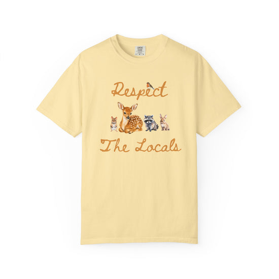 Yellow short-sleeve crewneck t-shirt featuring a graphic print of a fawn, a raccoon, and a rabbit under the text 'Respect The Locals' in orange-brown script.