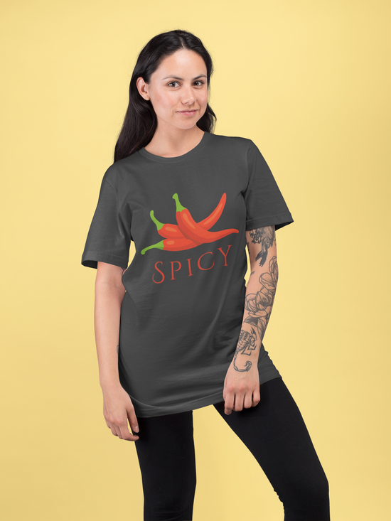 Black short-sleeve crewneck t-shirt featuring a graphic of three red chili peppers with green stems and the word 'SPICY' printed below in red, worn by woman