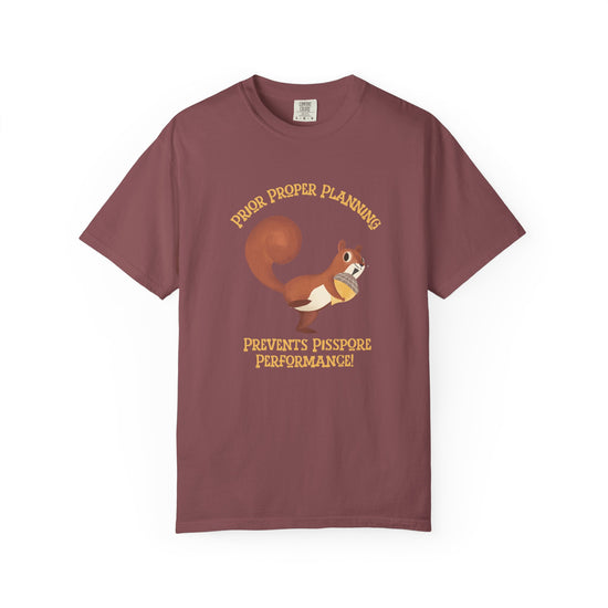 Red  short-sleeve crewneck t-shirt featuring a cartoon graphic of a squirrel holding an acorn, with the text 'PIOR PROPER PLANNING 'PREVENTS PISSPORE PERFORMANCE!' below in orange-yellow lettering.
