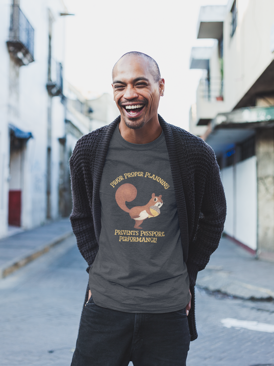 Vintage black short-sleeve crewneck t-shirt featuring a cartoon graphic of a squirrel holding an acorn, with the text 'PIOR PROPER PLANNING 'PREVENTS PISSPORE PERFORMANCE!' below in orange-yellow lettering.