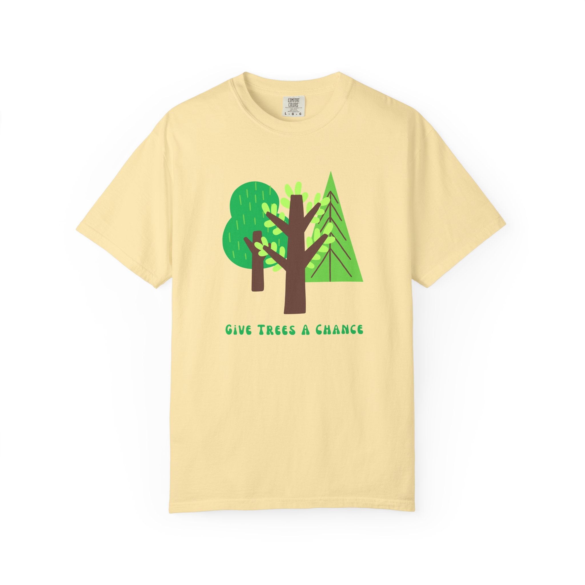 Yellow t-shirt with green trees graphic and 'Give Trees a Chance' text 