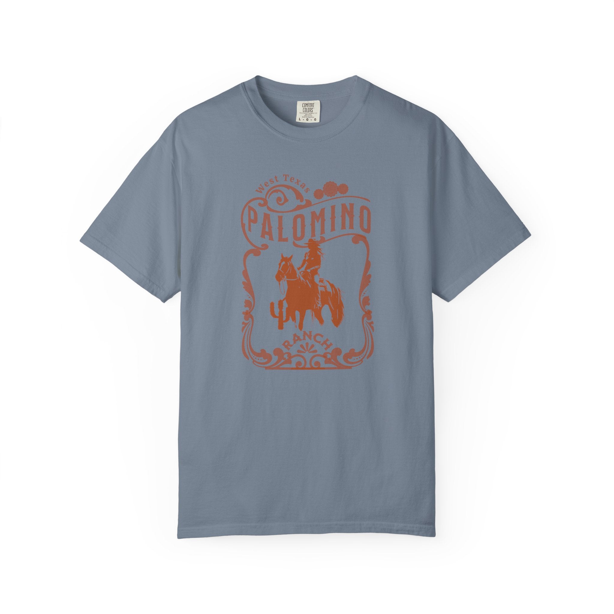 blue t-shirt with a graphic design of a horse and rider, and 'Palomino Ranch' text 