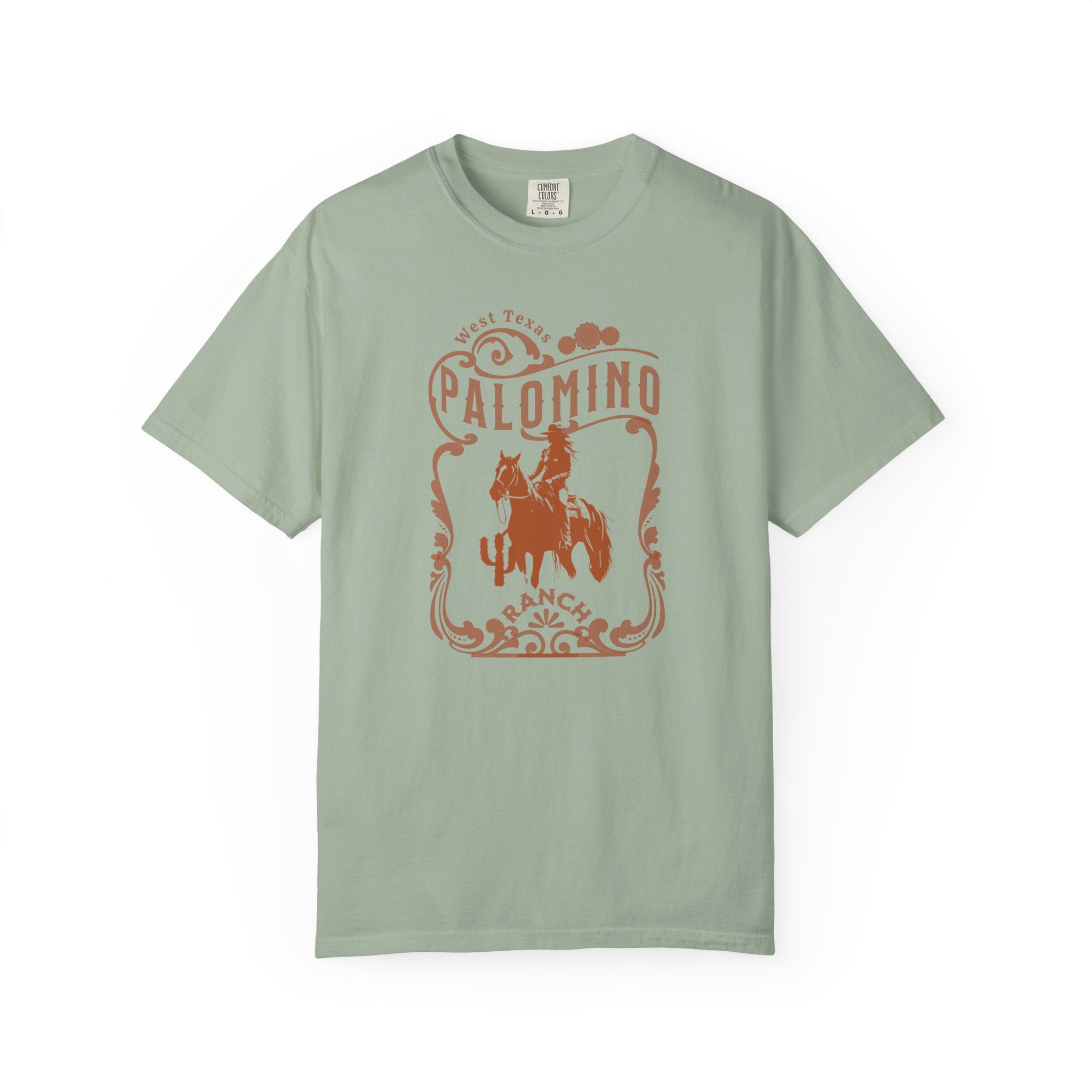 Green t-shirt with a graphic design of a horse and rider, and 'Palomino Ranch' text 