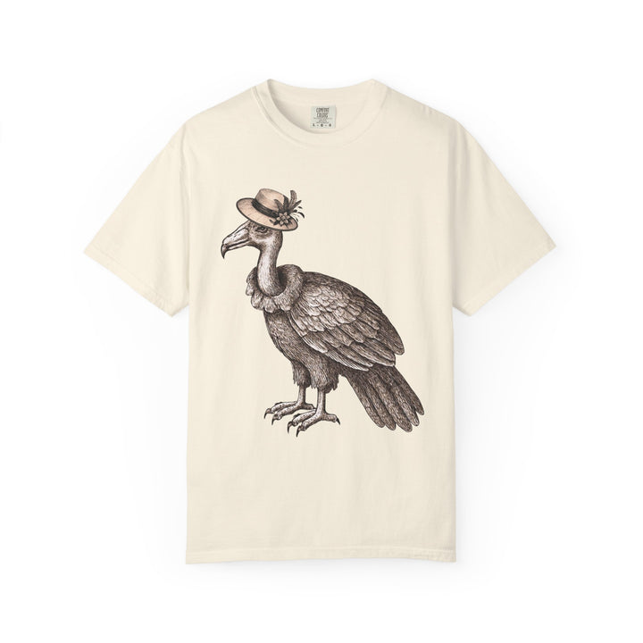 Beige t-shirt with a graphic of a vulture bird wearing a vintage hat 