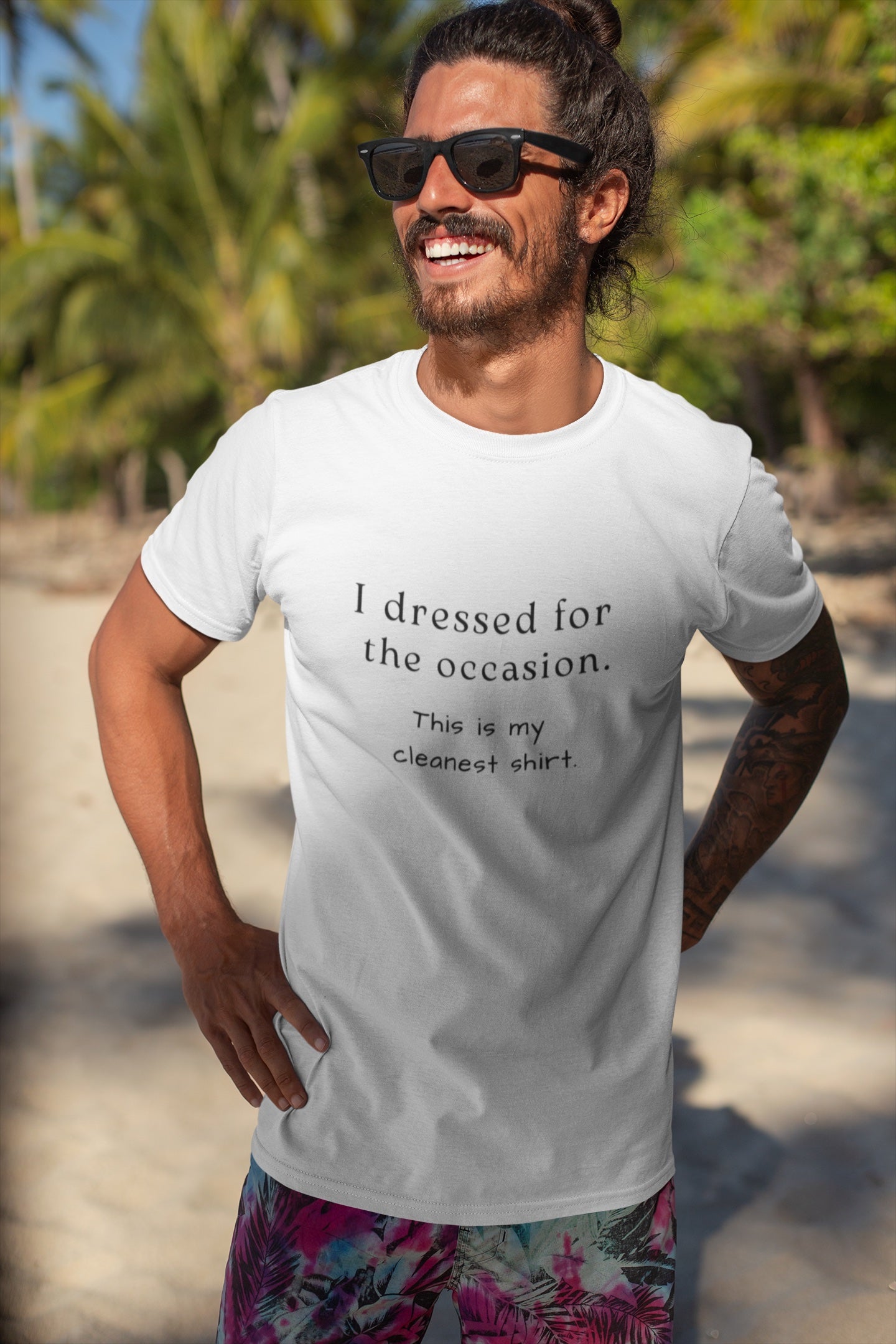 White t-shirt with text that says "I dressed for the occasion, this is my cleanest shirt." worn by man