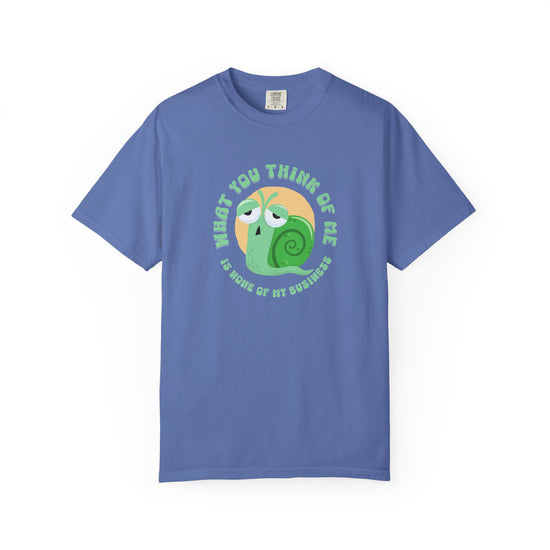 Blue short-sleeve crewneck t-shirt featuring a cartoon graphic of a green snail inside a yellow circle, with the text 'WHAT YOU THINK OF ME IS SOME OF MY BUSINESS' printed around it.